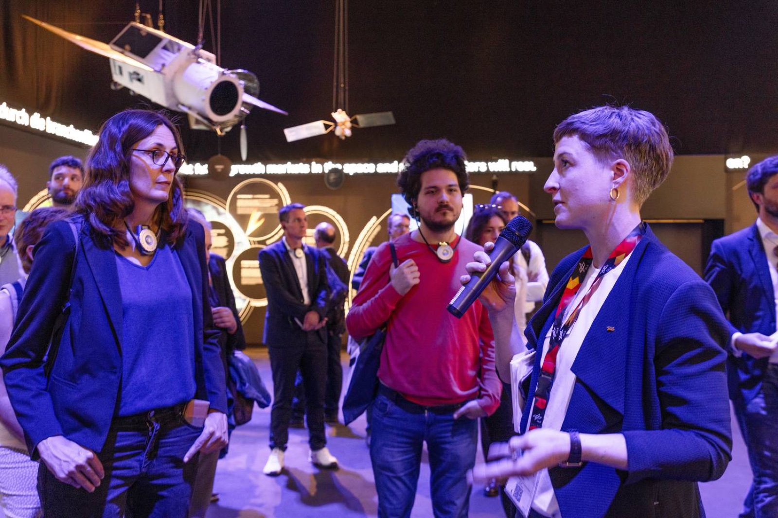 Guide explaining in the Space Pavilion